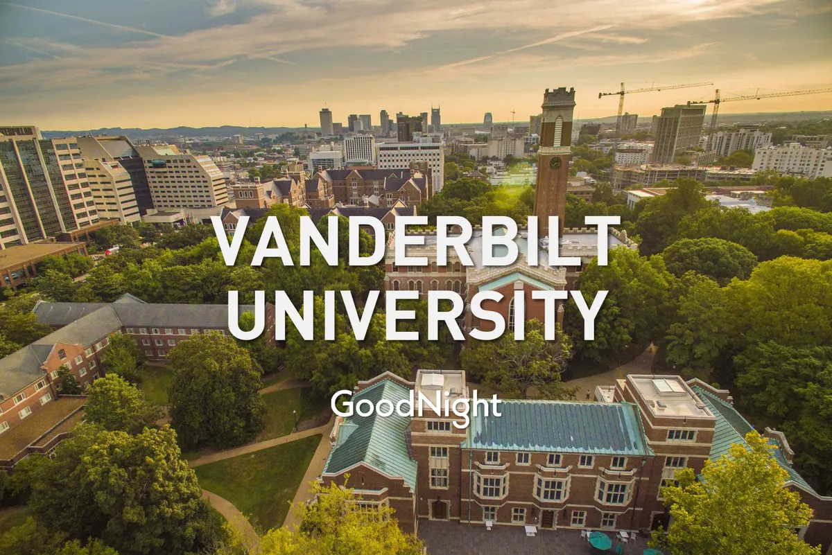 This image presents the iconic Vanderbilt University buildings and clock tower framed by lush greenery and the Nashville skyline in the background. The scene is tranquil yet inspiring, capturing a sense of proximity to campus and central Nashville attractions.